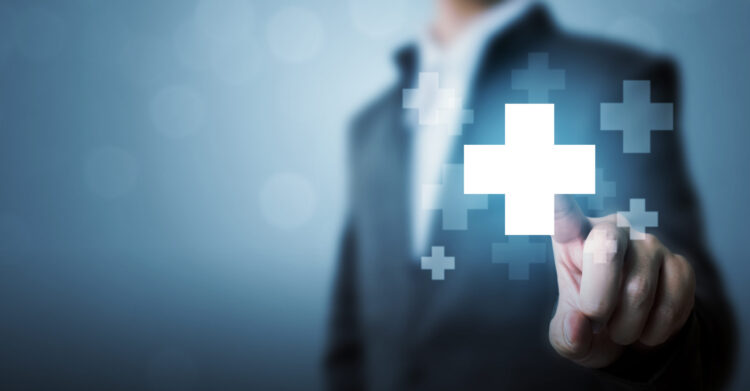 Businessman hand touching plus sign icon means to offer positive thing (like benefits, personal development, social network)